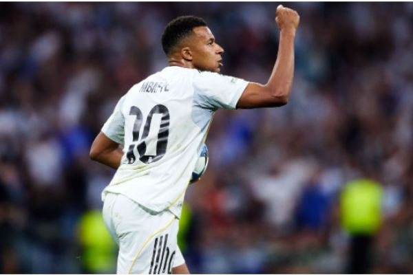 Mbappé fires Madrid past Marseille after Weah opener
