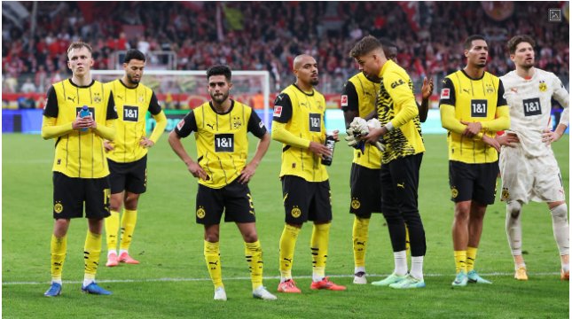 Days after record win over Celtic, Dortmund slump to 2-1 loss