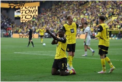 Dortmund crush Wolfsburg to get back into Champions League mix